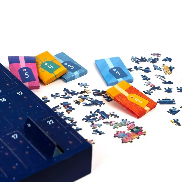 Puzzle Calendrier de l'Avent - Christmas through the Window - 24 x 50 pièces