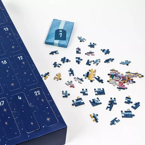 Puzzle Calendrier de l'Avent - Christmas through the Window - 24 x 50 pièces